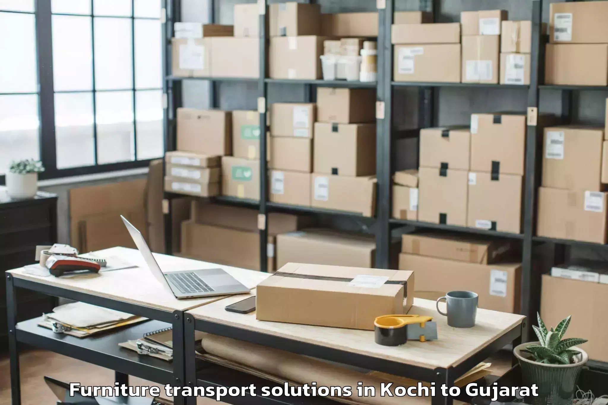 Book Kochi to Lunawada Furniture Transport Solutions Online